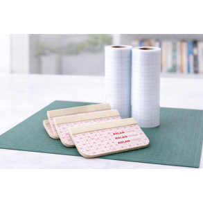 Bogskraber med filt kant til nem og j�vn p�f�ring af bogplast